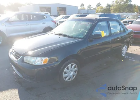 2001 Toyota Corolla Le z USA, uszkodzony, nr VIN 1NXBR12E71Z453244